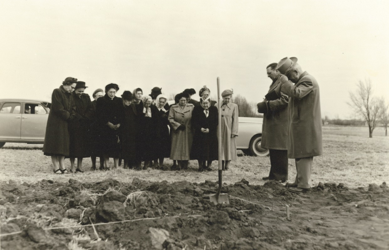 Prayer at groundbreaking for first community in 1949.