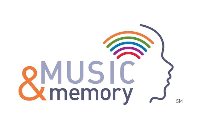 Logo of Music & Memory organization featuring the text “MUSIC & memory” and a stylized profile of a human head with radiating colorful arcs above it, symbolizing its impact on senior living programs.