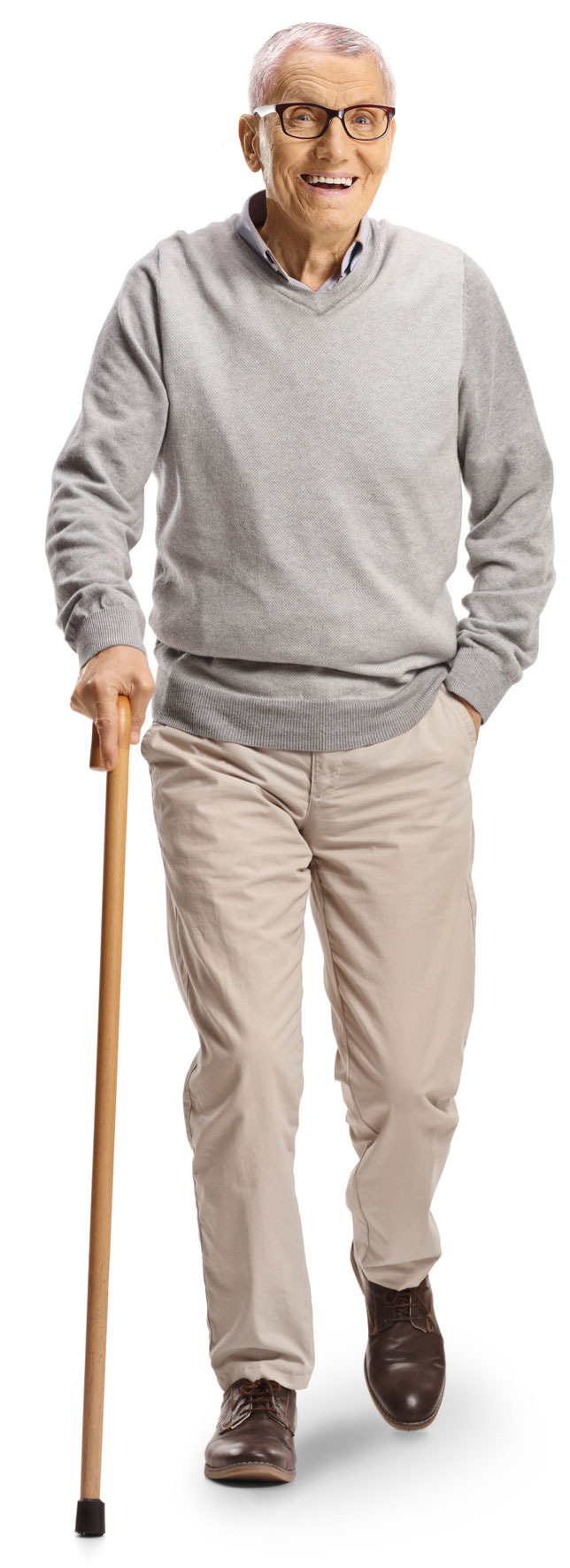 Elderly man with glasses wearing a gray sweater and light-colored pants, walking with a wooden cane and smiling, showcasing the benefits of senior health services.