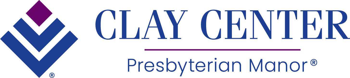 Logo of Clay Center Presbyterian Manor with a diamond-shaped design in blue and purple on the left and the text "Clay Center Presbyterian Manor" in blue on the right.