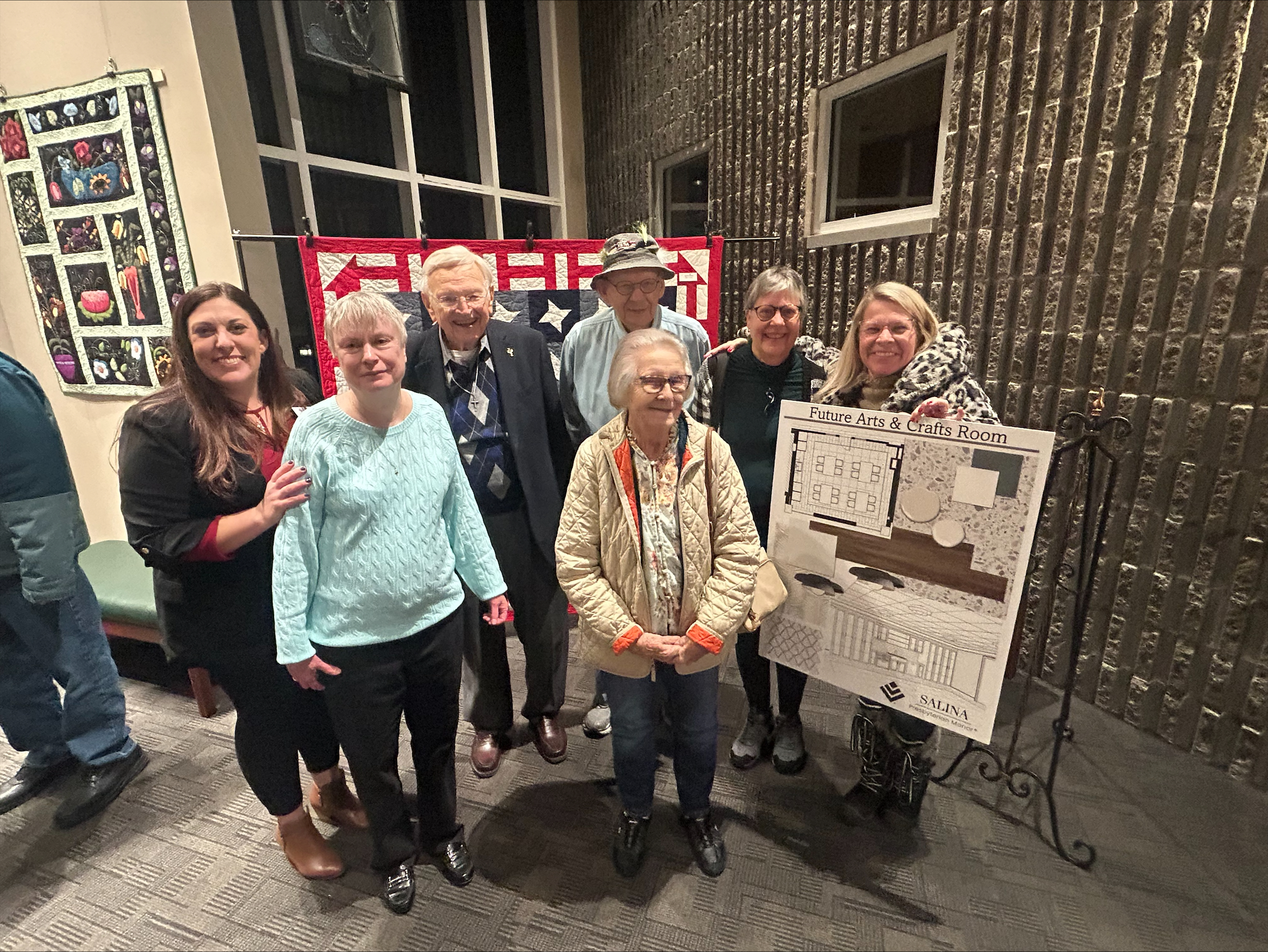 Group photo of Art is Ageless artists at their exhibit at Theatre Salina